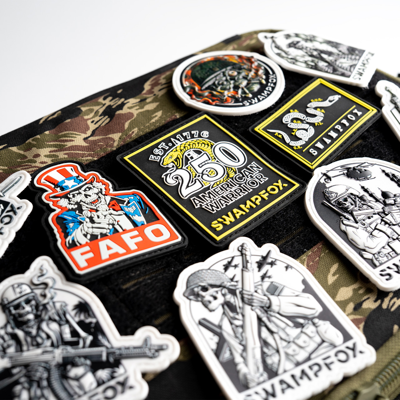 American Warrior patches on a camo panel